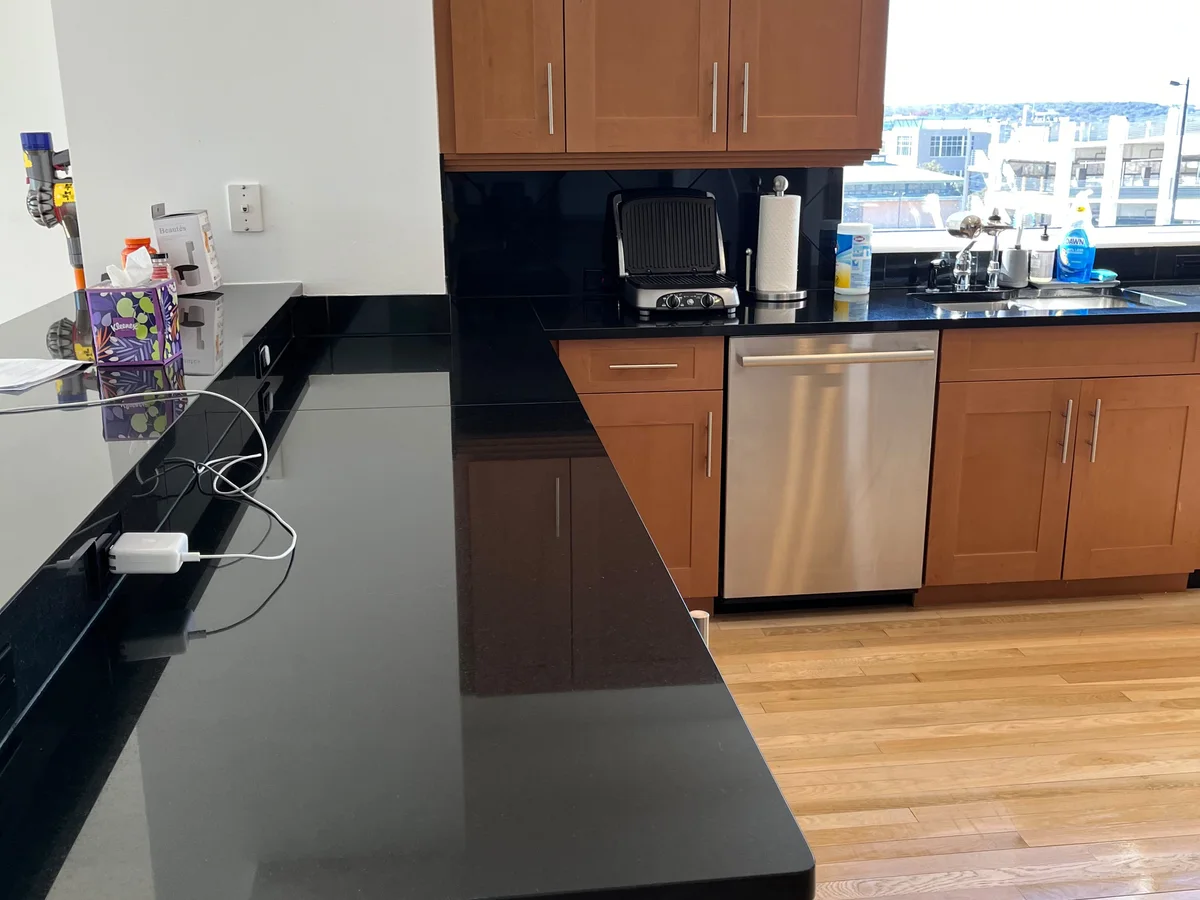 Clean open kitchen and common area in a commercial space