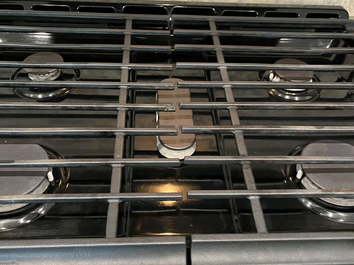 Gleaming stainless cooktop after a deep clean