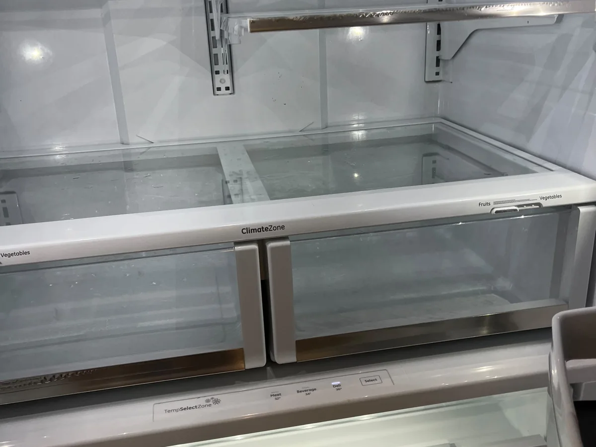 Empty refrigerator interior cleaned for a move-out
