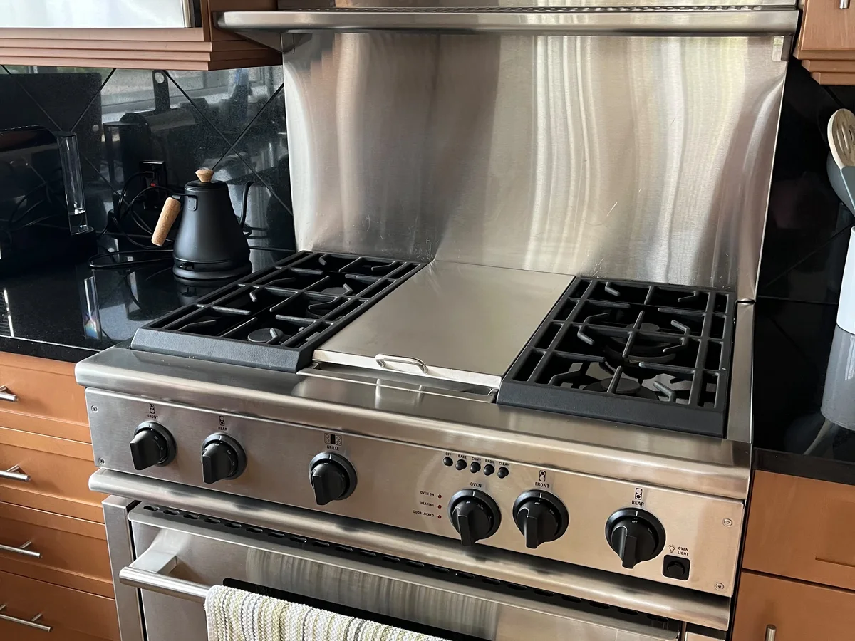 Spotless stainless range and hood we cleaned